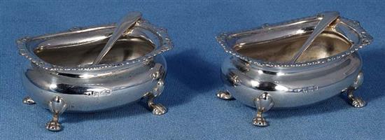 A pair of Victorian silver circular bun salts, 7.8oz/244 grams.